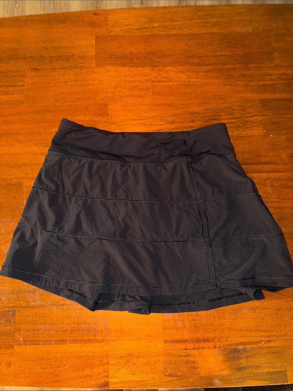 Lululemon ladies Pace Rival Skirt (Tall) *4-way Stretch. Size 4. Black. LW8AACT